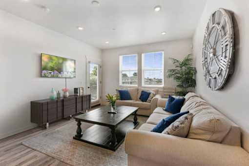 a living room with a couch and a table