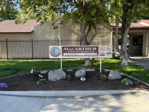 a sign in front of a building