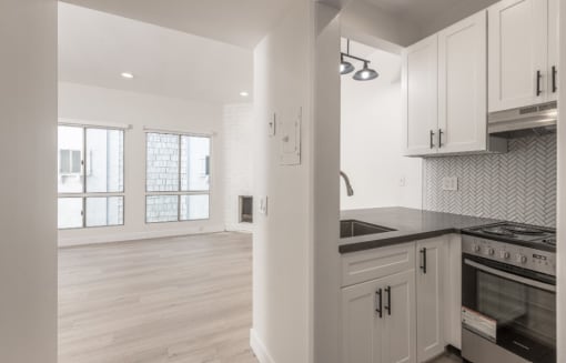Midvale Interior of Apartments View of Livingroom behind Open Kitchen