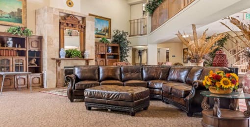a living room filled with furniture and a fire place