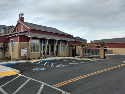 a building with a parking lot in front of it