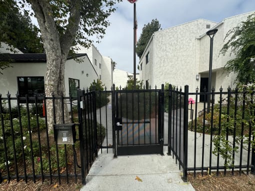 a gate entrance for the apartment buildings