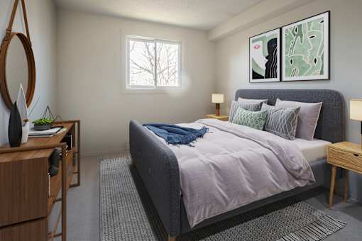 A bedroom with a bed, nightstand, and a painting on the wall.