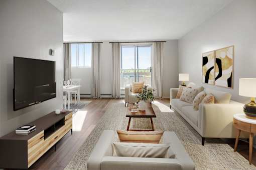 A modern living room with a flat screen TV, a white sofa, and a coffee table.