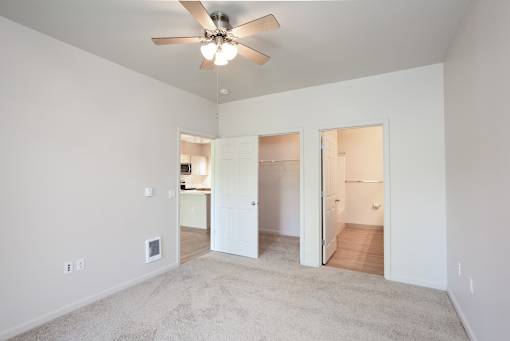 Vacant room with ceiling fan at Wilsonville Summit Apartments, Oregon , 97070