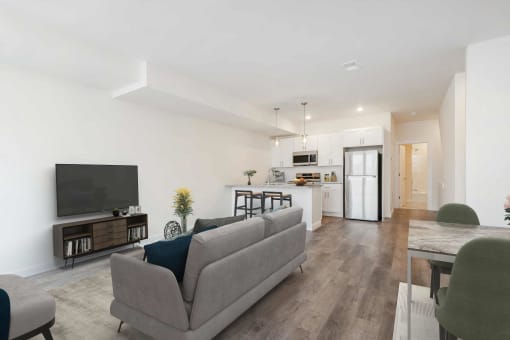 a living room with a couch and a tv