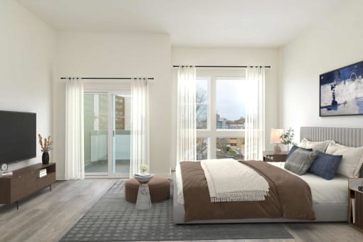 a bedroom with a bed and a tv
