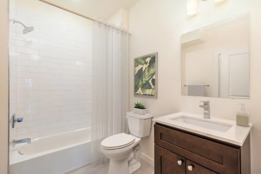 the preserve at ballantyne commons bathroom with toilet sink and shower