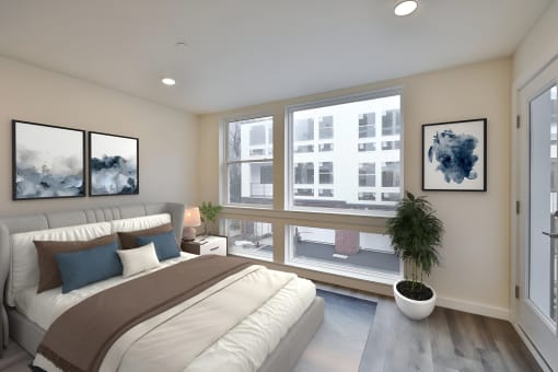 a bedroom with a bed and a chair and a window