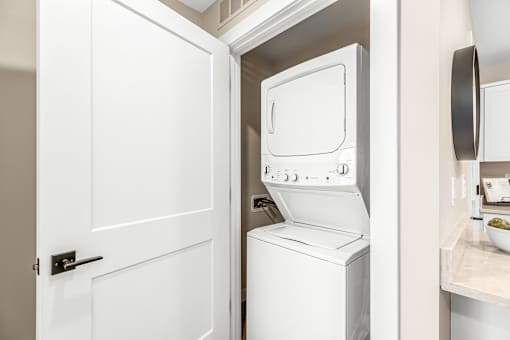 A white oven and microwave in a kitchen.