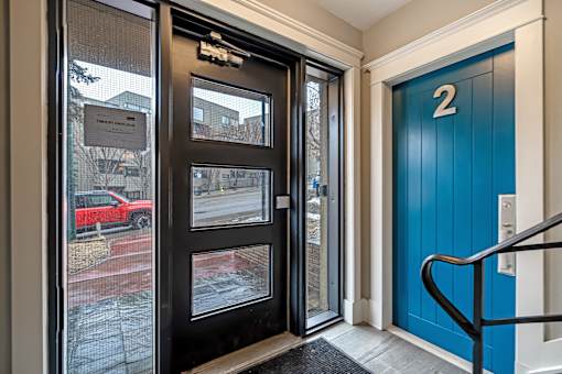 A blue door with the number 2 on it.