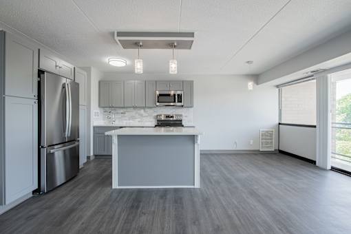an open kitchen with cabinets