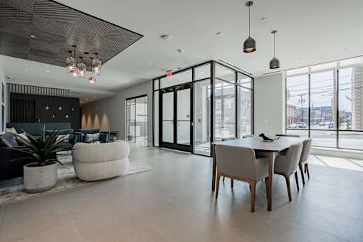 Bright and modern entrance lobby at The Rail at Bound Brook, with stylish furnishings and natural light showcasing downtown Bound Brook living.
