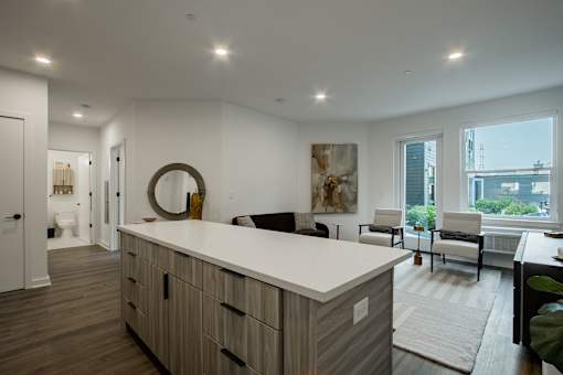 Modern kitchen island in a luxury apartment at The Rail at Bound Brook, NJ.