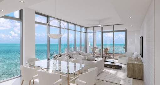 A modern living room with a view of the ocean.