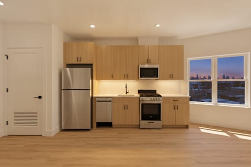 A kitchen with wooden cabinets and stainless steel appliances.