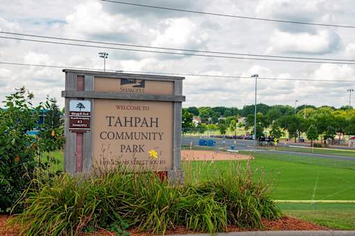 A sign welcoming people to Tahpah Community Park.