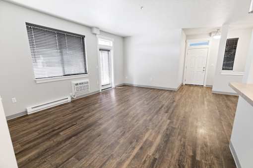 A room with wooden flooring at The Brix Apartments, Spokane Valley