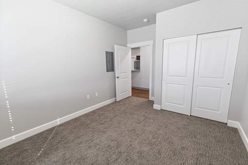 Carpeted Bedroom at The Brix Apartments, Washington