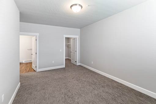 A room with carpeted floor and white walls.at The Brix Apartments, Spokane Valley, Washington