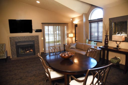 Living room decor with dining at Graymayre Crossing Apartments, Washington