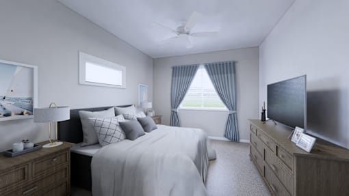 A bedroom with a large bed, a television, and a window with curtains.
