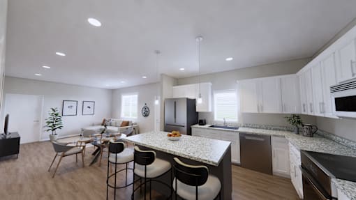 A modern kitchen with a dining table and chairs.