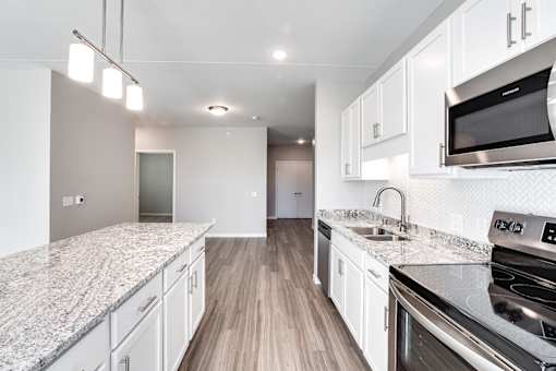 Cool Tone Kitchen, white, new, stainless, bright, Senior Apartment, Senior living, Maplewood, White Bear Lake, Saint Paul, Frost English Silver
