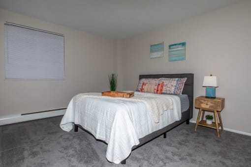 this is a photo of the bedroom of a 2 bedroom apartment at deer hill apartments in c