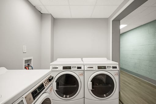 the preserve at ballantyne commons laundry room with washer and dryer