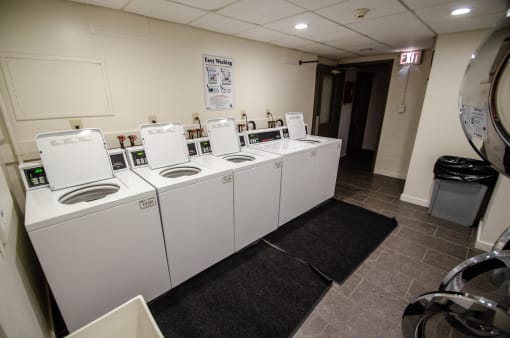 Laundry room at Thirteen 20 Seven Lakewood
