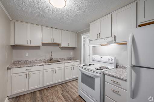 Kitchen with white cabinets