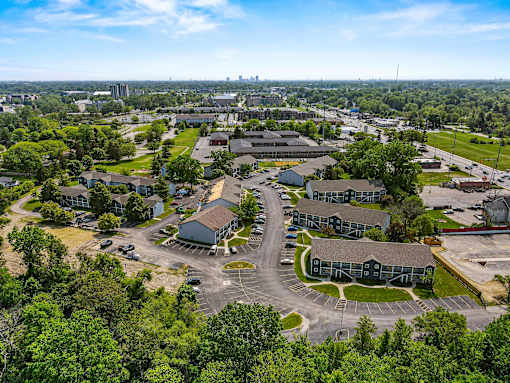 A bird's eye view of a residential area with houses and greenery. at Vivo Toledo Apartments, Ohio