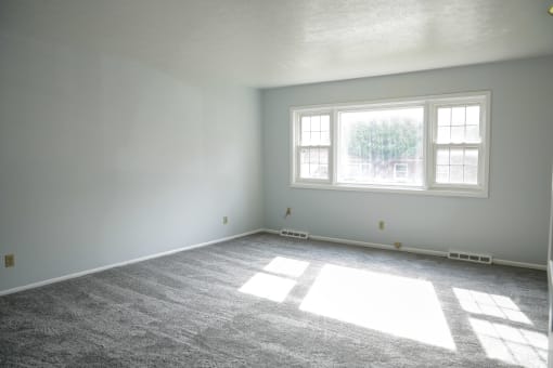 a living area with a large window