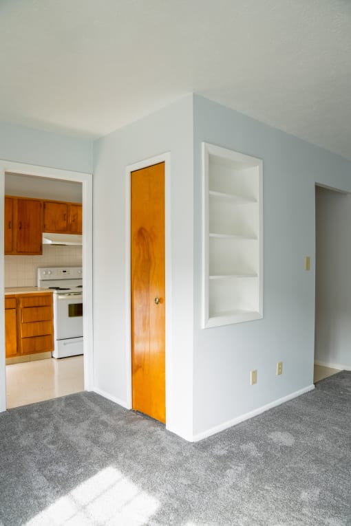 Living area with white shelving