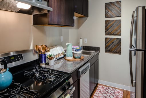 Electric Range In Kitchen at Heritage Apartments, Columbus