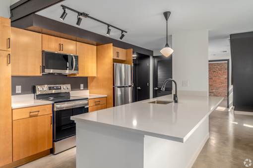 kitchen with white countertop at Life At Agora, Cleveland, OH