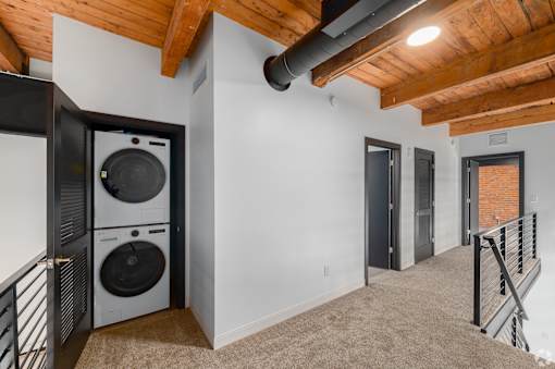 room with a washer and dryer at Life At Agora, Cleveland, OH