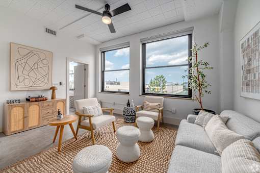 living room with two windows at Life At Agora, Cleveland, OH