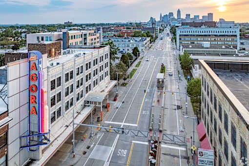 city street with a large Aura sign at Life At Agora, Ohio, 44103