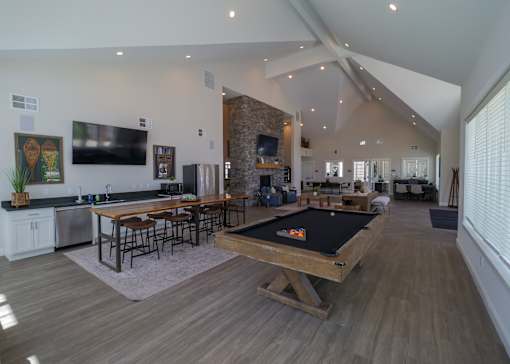 a large living room with a pool table and a television at The Bend, Lancaster, Ohio