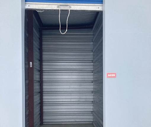 A small door with a sign that says A039 on it.