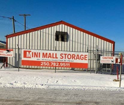 A storage facility called Mini Mall Storage is shown with a red and white sign.