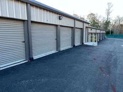 a row of garage doors on the side of a building