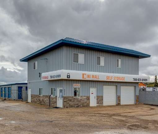 A storage facility with a sign that reads "Inni Mall Self Storage."