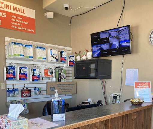 A store with a counter and a sign that says "MINI MALL".