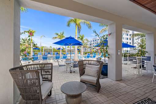 A Patio with Chairs at The Palmeri Residences, Naples, 34104