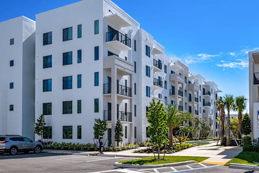 A Row of White Buildings at The Palmeri Residences, Naples, Florida