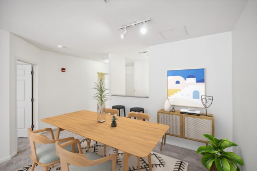 a dining room with a wooden table and chairs at Highlands at Faxon Woods, Quincy, Massachusetts