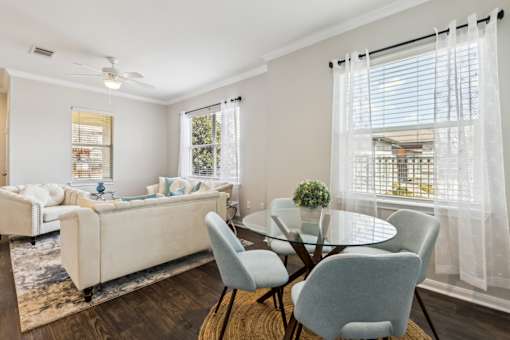 A Glass Dining Table at Flats on Chapel Apartments, Texas